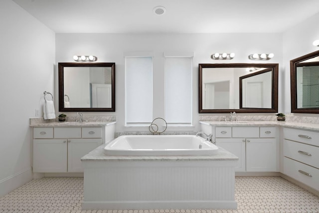 8421 Moritz Grn, Houston, TX 77055 - full bathroom with a bath and two vanities