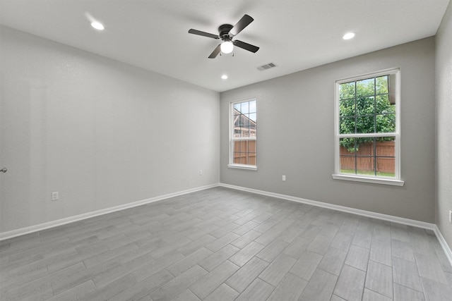 5118 Danfield Dr, Houston, TX 77053 - empty room with a ceiling fan, recessed lighting, and wood finished floors