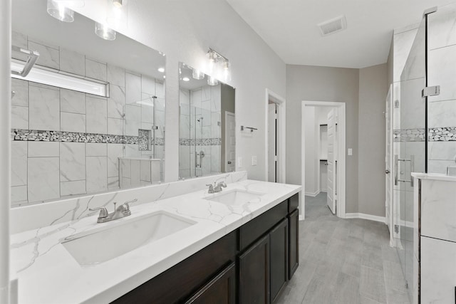 5118 Danfield Dr, Houston, TX 77053 - bathroom with a shower stall and double vanity