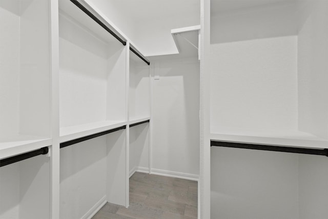 5118 Danfield Dr, Houston, TX 77053 - walk in closet with light wood finished floors