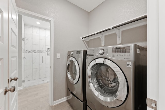 5118 Danfield Dr, Houston, TX 77053 - laundry room with washing machine and dryer
