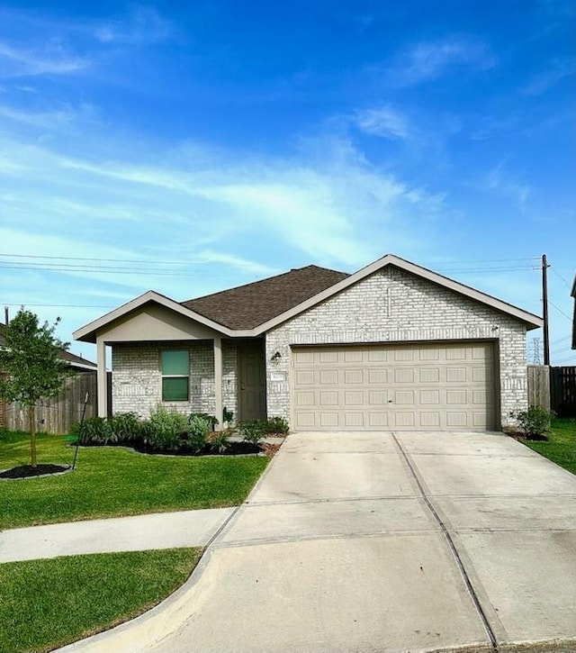 4206 Barrington Cove Ln, Baytown, TX 77521 - ranch-style house with brick siding, a garage, concrete driveway, and roof with shingles