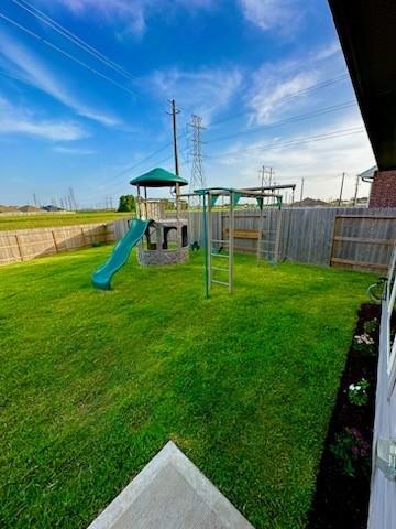 4206 Barrington Cove Ln, Baytown, TX 77521 - view of playground featuring a fenced backyard