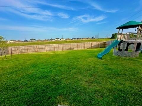 4206 Barrington Cove Ln, Baytown, TX 77521 - view of yard with a playground