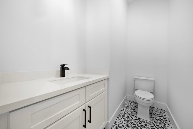 1305 Amundsen St N, Houston, TX 77009 - half bathroom featuring vanity and tile patterned flooring