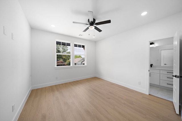 1305 Amundsen St N, Houston, TX 77009 - unfurnished bedroom with light wood-style floors, recessed lighting, connected bathroom, and ceiling fan