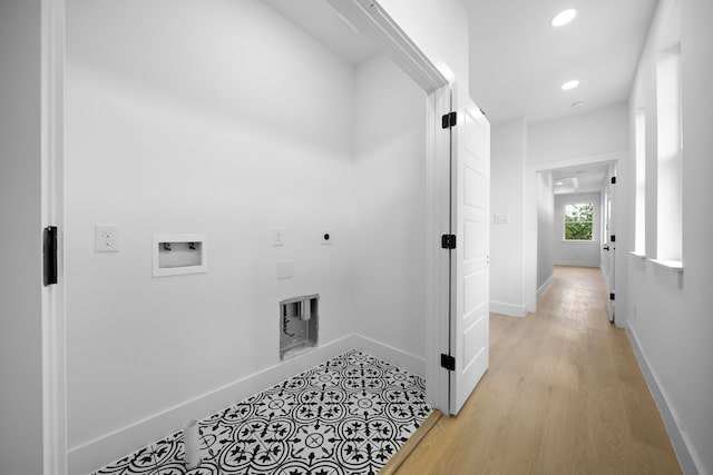 1305 Amundsen St N, Houston, TX 77009 - laundry room with hookup for an electric dryer, hookup for a washing machine, recessed lighting, and light wood finished floors