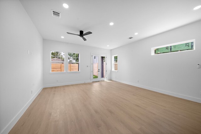 1305 Amundsen St N, Houston, TX 77009 - unfurnished room featuring recessed lighting, light wood-type flooring, and a ceiling fan
