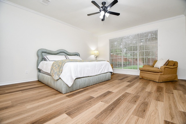 7014 Greatwood Trails Ct, Sugar Land, TX 77479 - bedroom with ornamental molding, wood finished floors, and ceiling fan