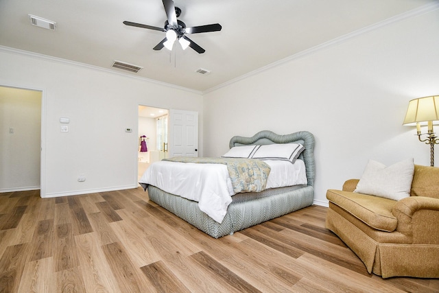 7014 Greatwood Trails Ct, Sugar Land, TX 77479 - bedroom with crown molding, light wood-style floors, connected bathroom, and a ceiling fan