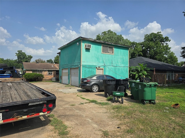9307 Irby St, Houston, TX 77088 - view of outbuilding featuring concrete driveway
