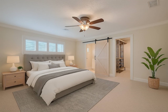 11710 Hillcroft St, Houston, TX 77035 - bedroom featuring a barn door, crown molding, light colored carpet, and ceiling fan