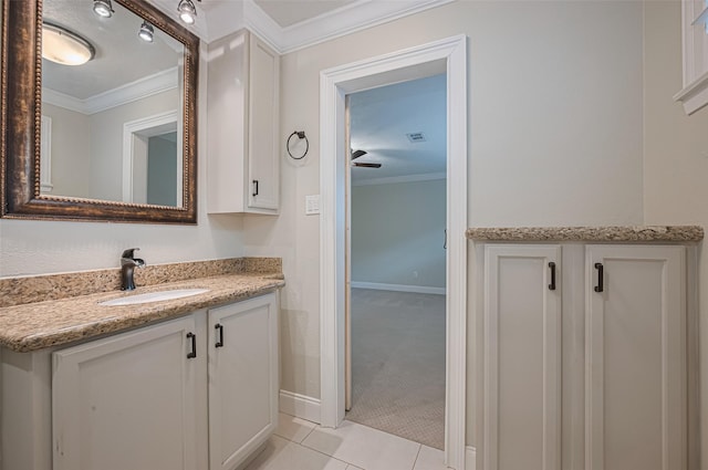 11710 Hillcroft St, Houston, TX 77035 - bathroom with ornamental molding, vanity, tile patterned flooring, and ceiling fan