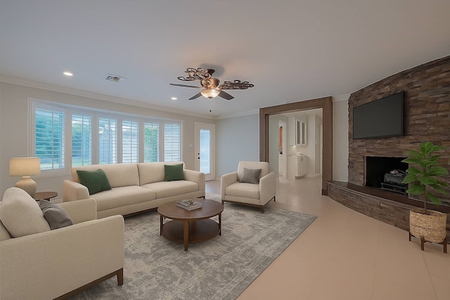 11710 Hillcroft St, Houston, TX 77035 - living area featuring a ceiling fan, a fireplace, crown molding, and recessed lighting