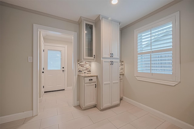 11710 Hillcroft St, Houston, TX 77035 - corridor featuring crown molding, light tile patterned floors, and recessed lighting