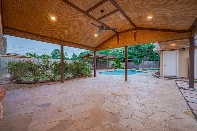 11710 Hillcroft St, Houston, TX 77035 - fenced backyard featuring a ceiling fan and a patio