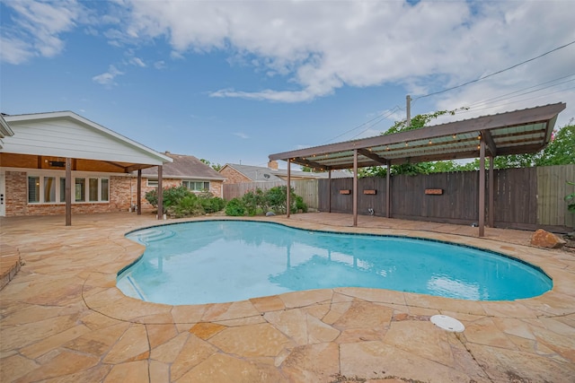 11710 Hillcroft St, Houston, TX 77035 - view of pool featuring a fenced backyard and a patio area