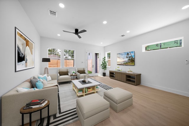1307 Amundsen St N, Houston, TX 77009 - living room featuring wood finished floors, recessed lighting, and a ceiling fan