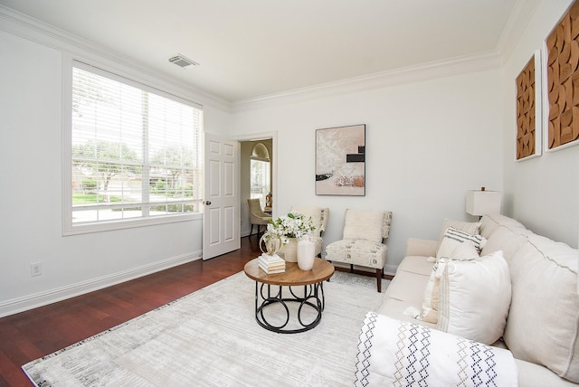 7010 Mcclellan Ln, Sugar Land, TX 77479 - living room featuring wood finished floors and crown molding