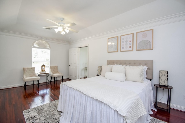 7010 Mcclellan Ln, Sugar Land, TX 77479 - bedroom featuring wood finished floors, a closet, crown molding, and ceiling fan
