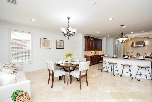 7010 Mcclellan Ln, Sugar Land, TX 77479 - dining area with a chandelier, ornamental molding, and recessed lighting