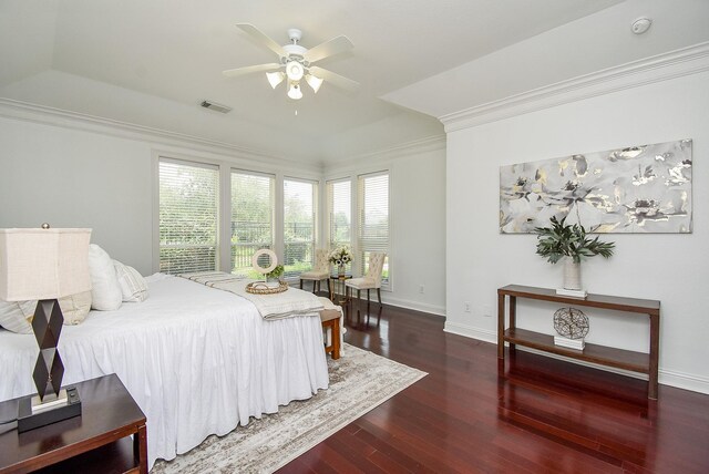 7010 Mcclellan Ln, Sugar Land, TX 77479 - bedroom with crown molding, wood finished floors, multiple windows, and a ceiling fan
