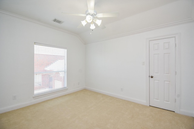 7010 Mcclellan Ln, Sugar Land, TX 77479 - empty room featuring crown molding, ceiling fan, light colored carpet, and vaulted ceiling