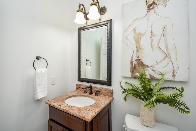 7010 Mcclellan Ln, Sugar Land, TX 77479 - bathroom featuring vanity and a chandelier