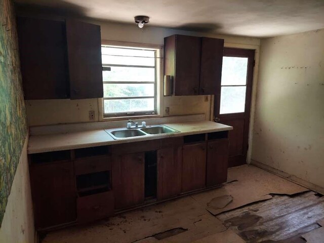 343 NW Martin Luther King Dr, De Kalb, TX 75559 - kitchen featuring healthy amount of natural light and light countertops