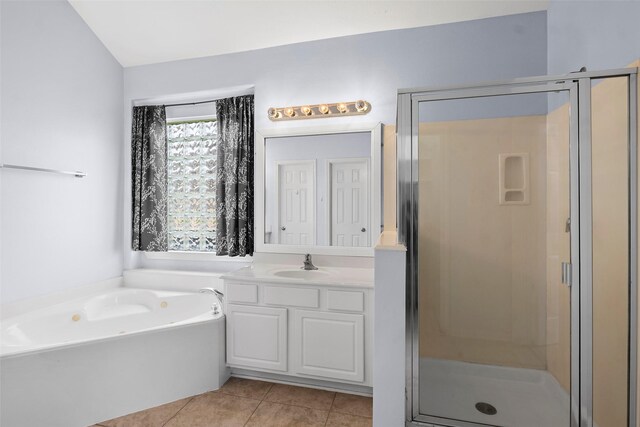 12610 Hobbs Terrace Dr, Tomball, TX 77377 - bathroom featuring a stall shower, vanity, tile patterned flooring, and a bath