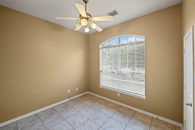 12610 Hobbs Terrace Dr, Tomball, TX 77377 - empty room with light tile patterned floors and ceiling fan