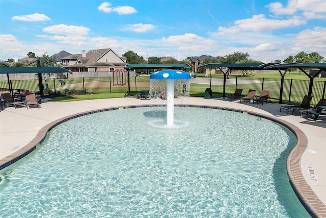 12610 Hobbs Terrace Dr, Tomball, TX 77377 - community pool with a patio area