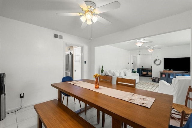 431 Shadow Creek Dr, El Lago, TX 77586 - dining room with ceiling fan and light tile patterned floors
