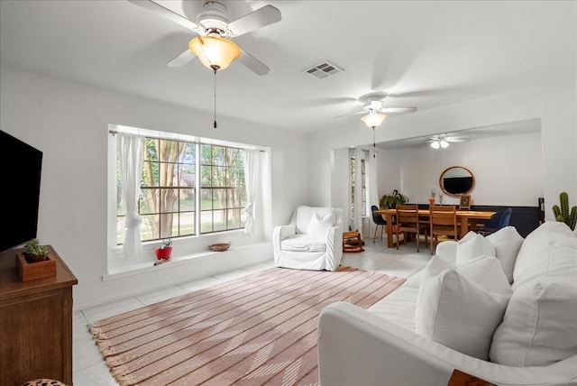 431 Shadow Creek Dr, El Lago, TX 77586 - living area with a ceiling fan and light tile patterned floors