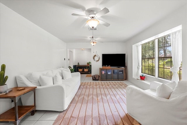 431 Shadow Creek Dr, El Lago, TX 77586 - living room featuring a ceiling fan and light tile patterned floors