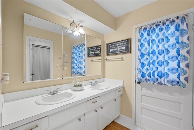 431 Shadow Creek Dr, El Lago, TX 77586 - full bath featuring double vanity and tile patterned floors