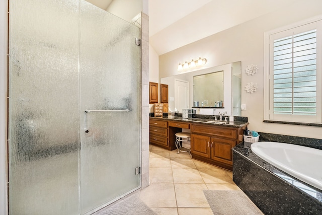 1114 Commons Waterway Dr, Huffman, TX 77336 - bathroom featuring plenty of natural light, a stall shower, tile patterned floors, vanity, and vaulted ceiling