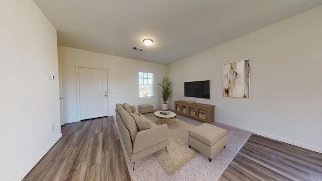 21643 Cottage Ln, New Caney, TX 77357 - living area with wood finished floors and baseboards
