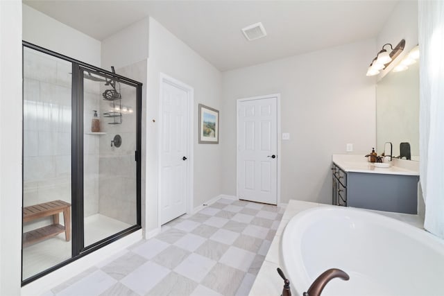 18534 Tall Woods Pl, Houston, TX 77084 - full bathroom with a garden tub, vanity, and a shower stall