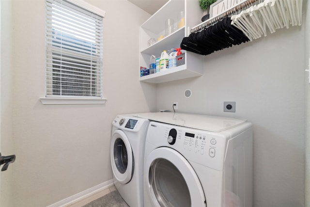 18534 Tall Woods Pl, Houston, TX 77084 - laundry area featuring washer and dryer and baseboards