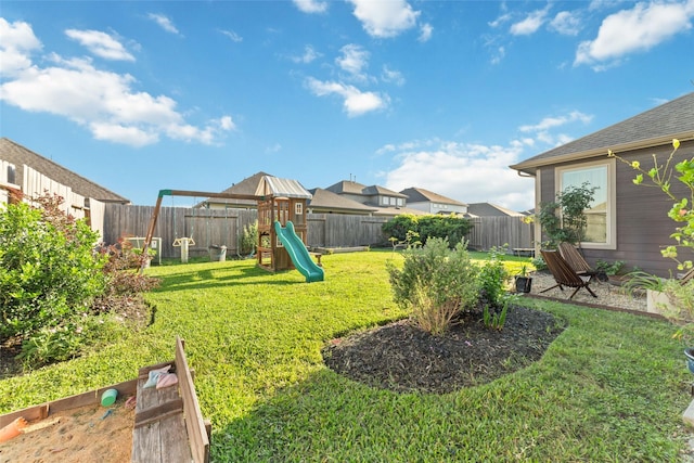 18534 Tall Woods Pl, Houston, TX 77084 - fenced backyard with a playground and a residential view