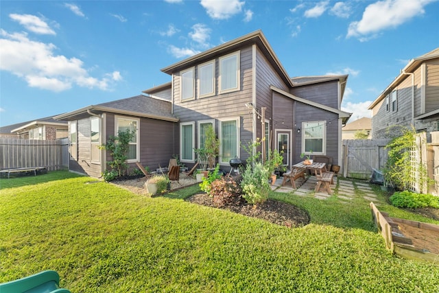 18534 Tall Woods Pl, Houston, TX 77084 - back of house with a patio and a fenced backyard