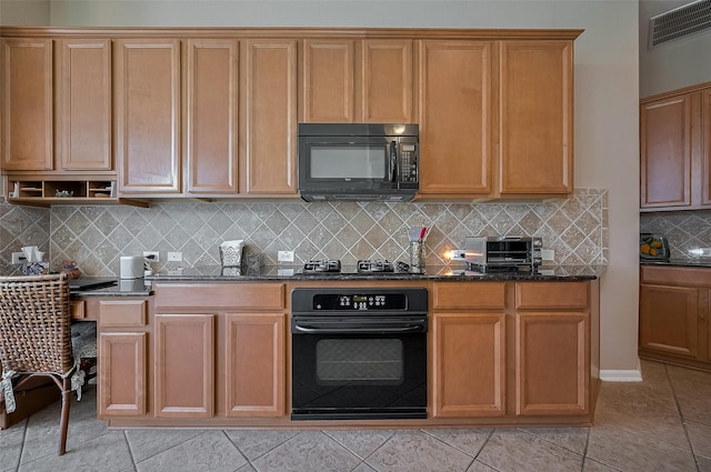 15902 Mill Canyon Ct, Cypress, TX 77429 - kitchen featuring black appliances, light tile patterned floors, dark stone countertops, tasteful backsplash, and open shelves