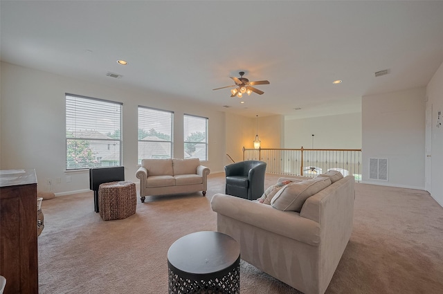 15902 Mill Canyon Ct, Cypress, TX 77429 - carpeted living area featuring a ceiling fan and recessed lighting