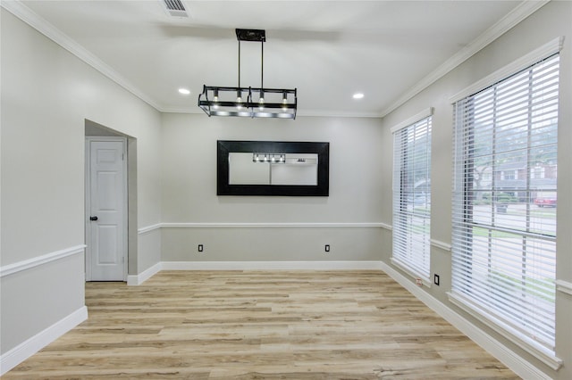13727 Sablegarden Ln, Houston, TX 77014 - unfurnished dining area featuring a chandelier, light wood-type flooring, ornamental molding, and recessed lighting