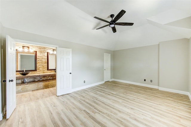 13727 Sablegarden Ln, Houston, TX 77014 - unfurnished bedroom featuring light wood-type flooring, lofted ceiling, ensuite bathroom, and ceiling fan