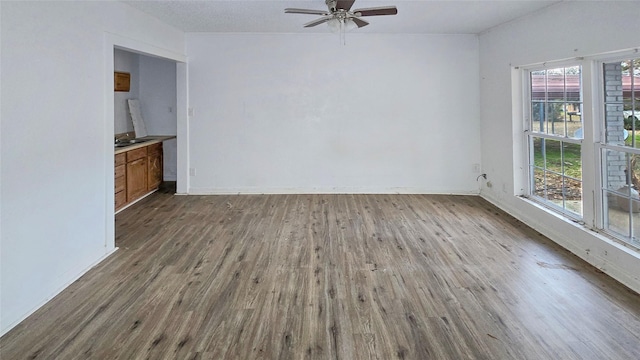 242 Bishop, Livingston, TX 77351 - unfurnished room featuring wood finished floors and ceiling fan