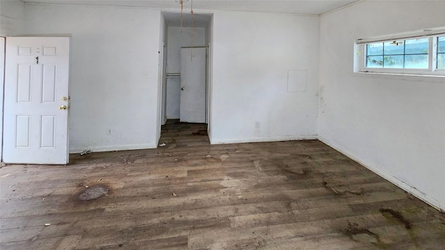 242 Bishop, Livingston, TX 77351 - unfurnished room with wood finished floors and baseboards