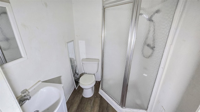 242 Bishop, Livingston, TX 77351 - full bath with a shower stall and wood finished floors