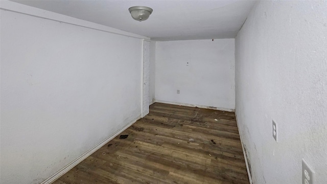 242 Bishop, Livingston, TX 77351 - spare room featuring wood finished floors